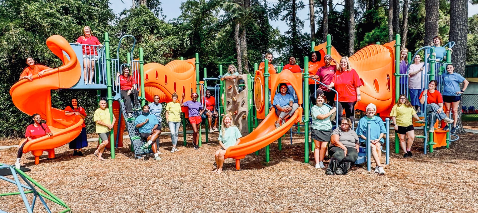 The Learning Tree teachers and staff on the playground